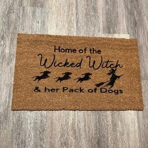 Home of the Wicked Witch and her Pack of Dogs decorative coir doormat